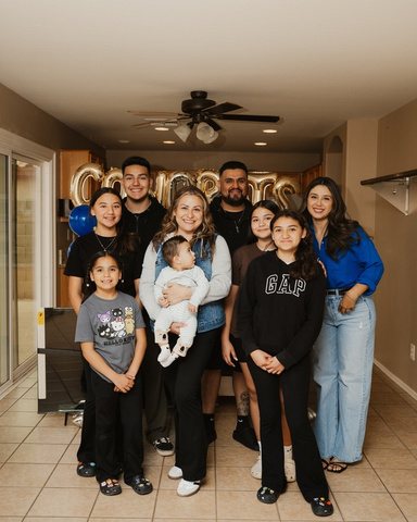 A family inside their new home on closing day